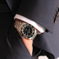 Montre Inguz La Teignouse cadran noir bracelet acier grains de riz portée